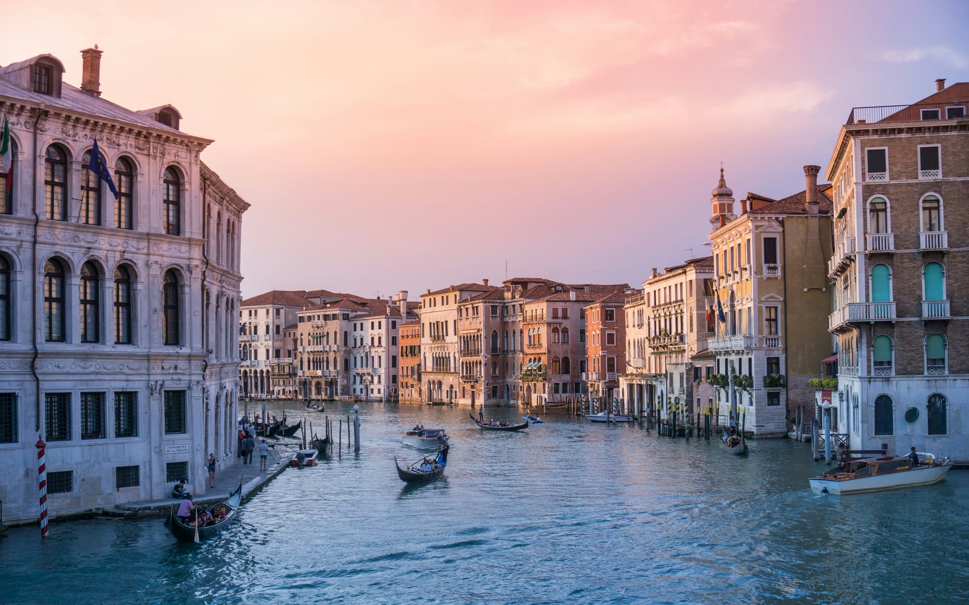 Venice waterways full of gondolas.
